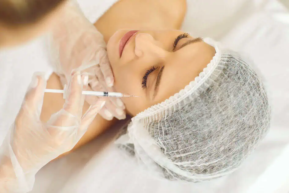 Woman smiling naturally after neurotoxins treatment showing smooth skin and preserved facial expression